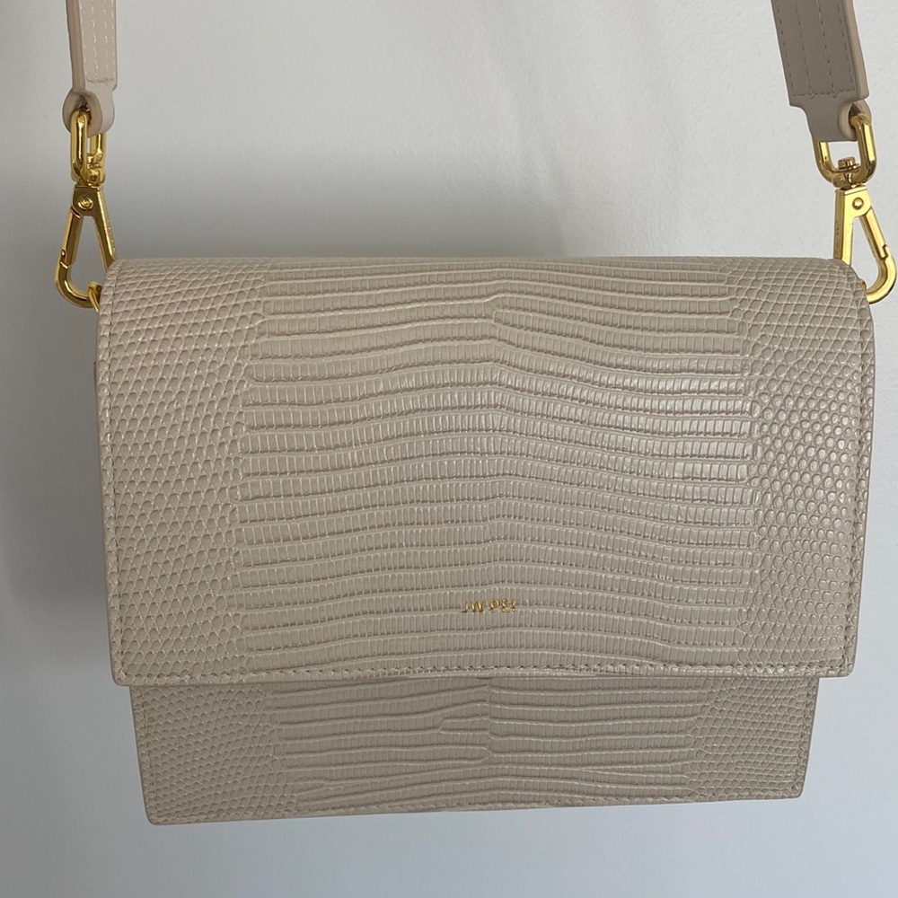 white JW Pei purse crossbody. Barely worn. Feel free to ask questions!